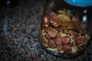 Assorted nuts on old kitchen. walnuts, hazelnuts, cashews, ...
