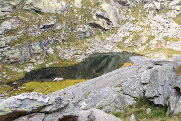 The small and pretty lake of Monte Camino, in the Biella pre-Alps above Oropa