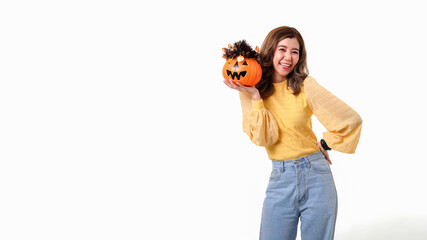 Portrait of Asian smiling woman holding curved pumpkin and looking at camera isolated over white background Halloween concept.