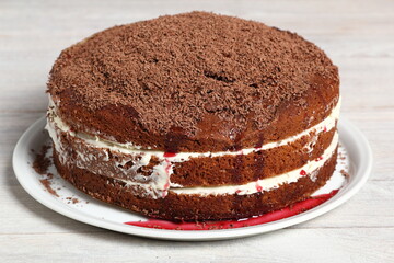 Layer Cake with cream with grated chocolate topping