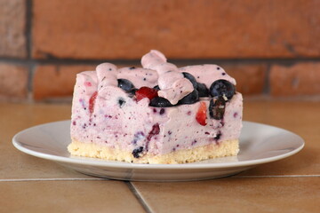 Cold cheesecake with blueberry and strawberry