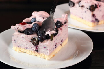 Cold cheesecake with blueberry and strawberry