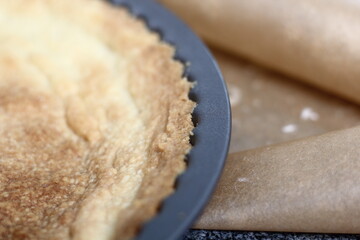 Freshly Baked Tart Base in Tin. Making Boston Banoffee Pie.