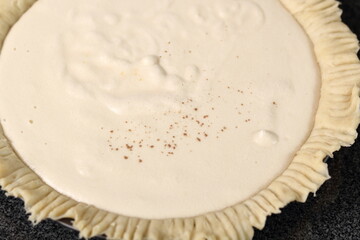 Sprinkle top of filling with grated nutmeg. Making Cider Pie Series.