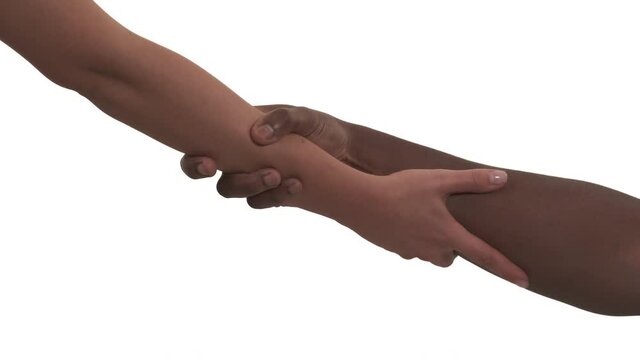 Unrecognizable mixed race couple's hands raising to each other. Woman grabs man's hand, trying to pull guy out and letting him go. Isolated on white background.