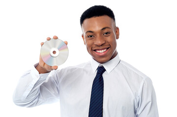 Businessman showing compact disc