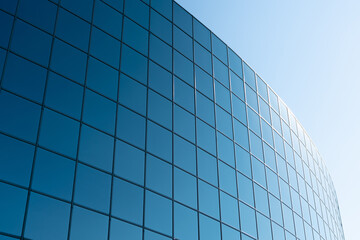 city ​​business buildings mirror windows with blue sky reflections industry curves modern buildings abstract texture