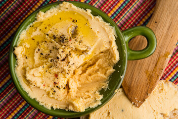 A bowl of creamy hummus