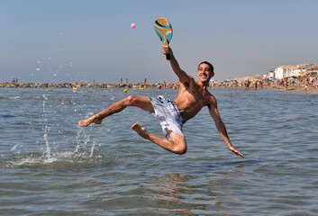 beach tennis in the sea