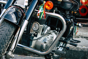 Closeup of a motorcycle parked in the streets of the city center of the metropolitan area
