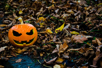 
There is a pumpkin in the lower left corner. Halloween holiday. Fear, horror, fun.
