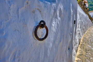 Ring in a white wall