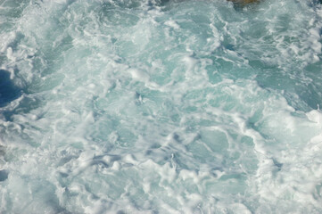 sea boils, strong surf, waves, white foam