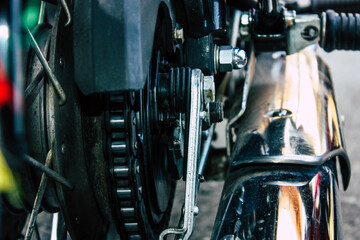 Closeup of a motorcycle parked in the streets of the city center of the metropolitan area
