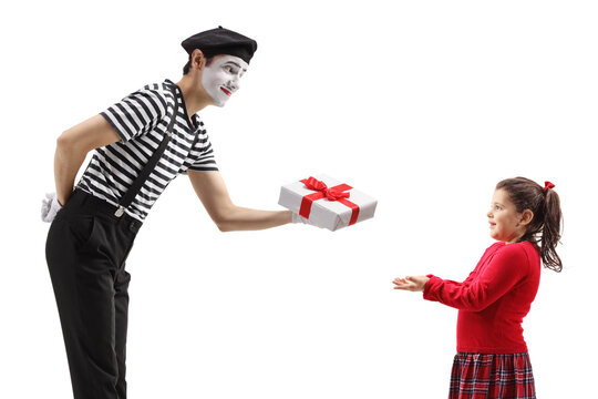 Pantomime man giving a gift box to a little girl