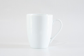 white cup in white background