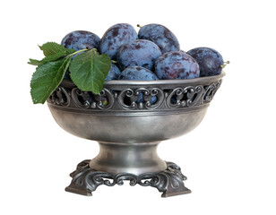 The fresh ripe Stanley Plums in a vase isolated on white background