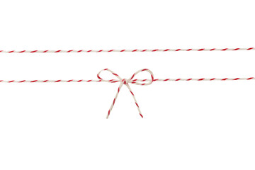 Twine rope with tied  bow isolated in white.Christmas decoration.Braided string for packing.Parcel...