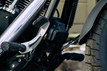 Closeup of a motorcycle parked in the streets of the city center of the metropolitan area
