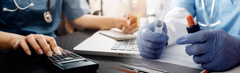 Medical technology concept The doctor works with mobile phones, headphones and tablets. Digital laptop in the modern office at the hospital in the morning
