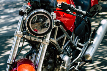 Closeup of a motorcycle parked in the streets of the city center of the metropolitan area
