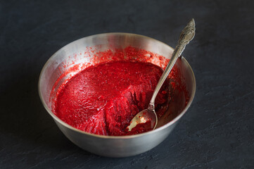 Homemade strawberry ice cream in the steel bowl on a dark background. Organic ice cream withour sugar. 
