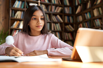 Indian latin girl school pupil distance learning online at remote virtual class with teacher by...