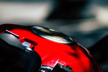 Closeup of a motorcycle parked in the streets of the city center of the metropolitan area
