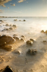 sunset of coral reef coastline