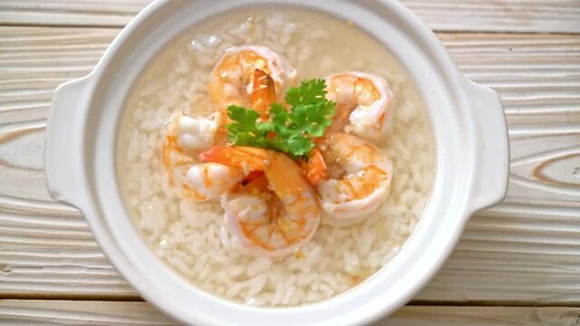 porridge or boiled rice soup with shrimps bowl