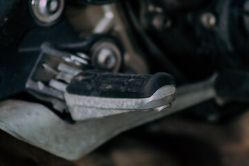 Closeup of a motorcycle parked in the streets of the city center of the metropolitan area
