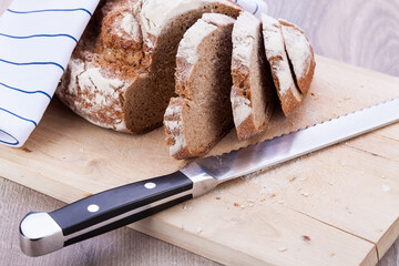 homemade fresh baked bread and knife 