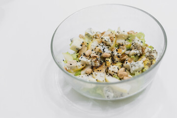 homemade healthy fresh salad with blue cheese, pears, nuts and balsamic dressing, vegetable salat
