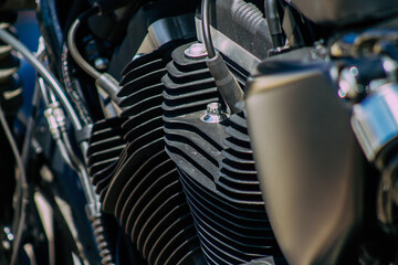 Closeup of a motorcycle parked in the streets of the city center of the metropolitan area
