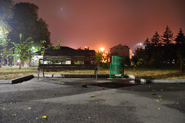 photo of a bench in the night city