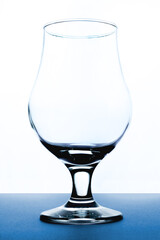 glass on white and blue background