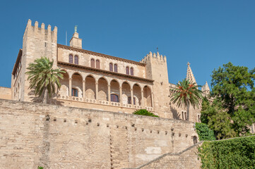 Fototapeta na wymiar Walls and Almudaina Palace on a sunny day