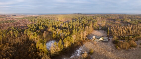 Early spring drone landscape. European forest and fields.
