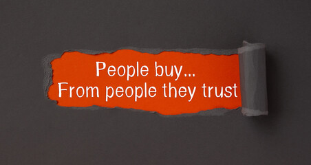 People buy from people they trust, appearing from tattered brown paper