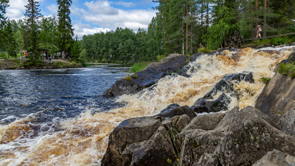 Fototapeta na wymiar Ruskeala waterfalls in the Republic of Karelia, Russia
