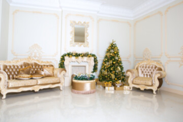 Luxury living room interior decorated with chic Christmas tree.