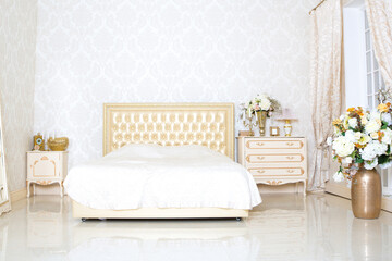 Luxury elegant white with gold interior design of bedroom