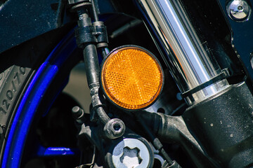 Closeup of a motorcycle parked in the streets of the city center of the metropolitan area
