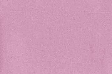 Fototapeta premium A vintage rough sheet of the carton with a gradient color. Recycled environmentally friendly retro cardboard paper texture. Simple and bright minimalist papercraft background.