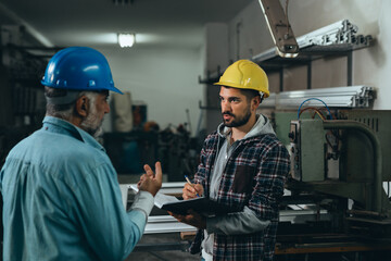 Aluminium and PVC industry workers talking