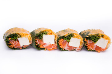 Fresh mouth-watering rolls are laid out in a row on the background