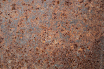 Dark worn out rusty metal sheet. Texture background.