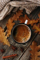 Americano coffee and oak leaves on the table