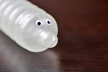 Funny condom with eyes