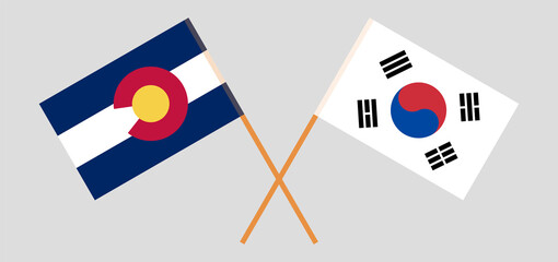 Crossed flags of The State of Colorado and South Korea